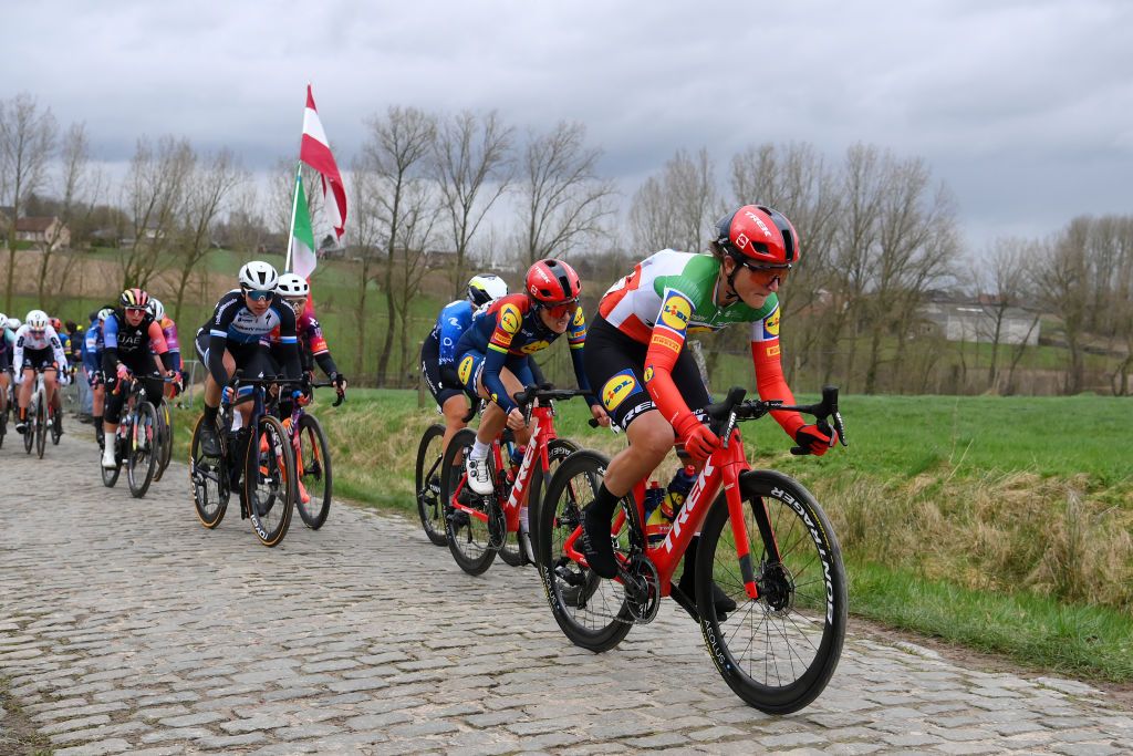 NINOVE BELGIUM FEBRUARY 24 Elisa Longo Borghini of Italy and Team LidlTrek competes passing through a cobblestones sector during the 16th Omloop Het Nieuwsblad 2024 Womens Elite a 1271km one day race from Ghent to Ninove UCIWWT on February 24 2024 in Ninove Belgium Photo by Alex BroadwayGetty Images