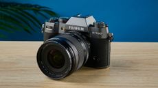 A Fujifilm X-T50 camera in the charcoal grey colorway