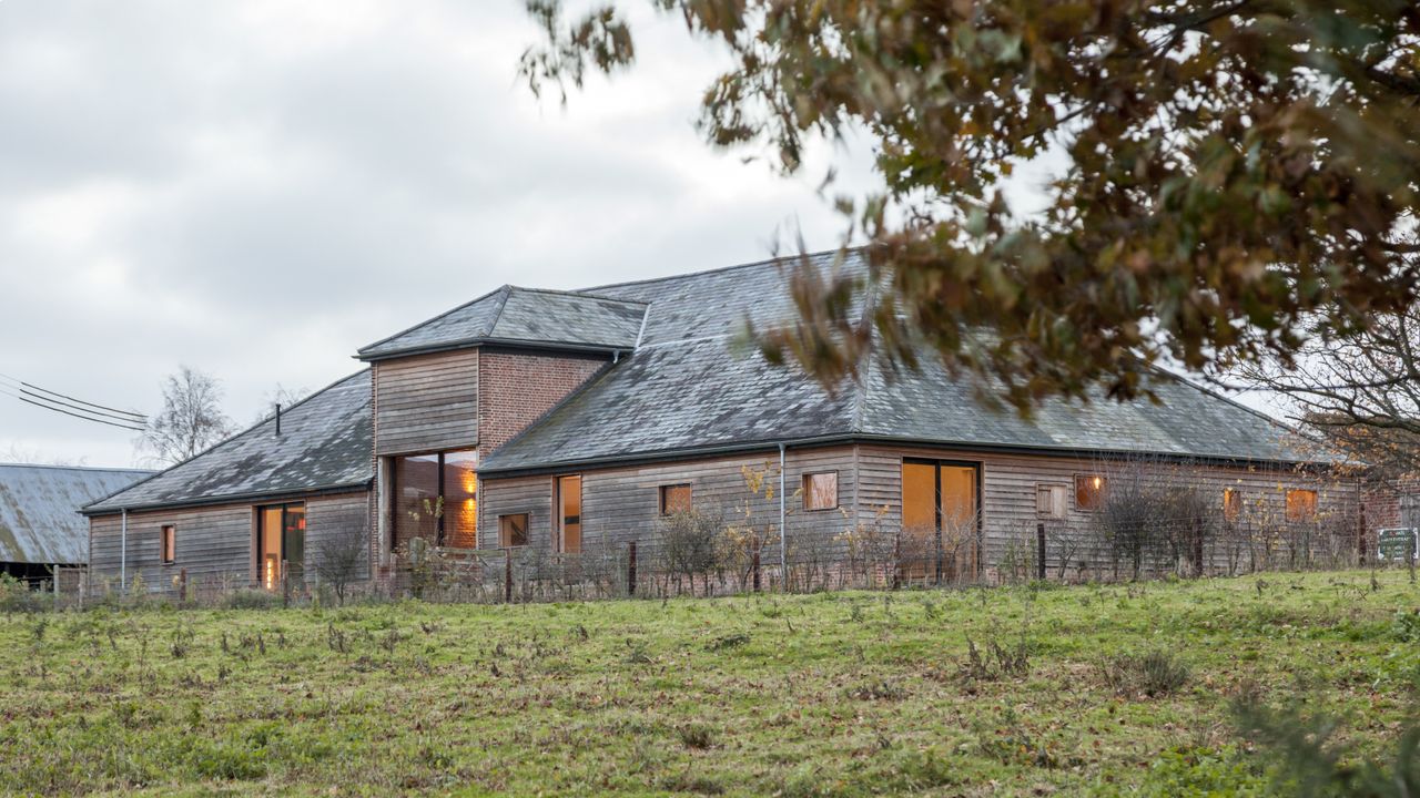 exterior of barn conversion with lots of different windows