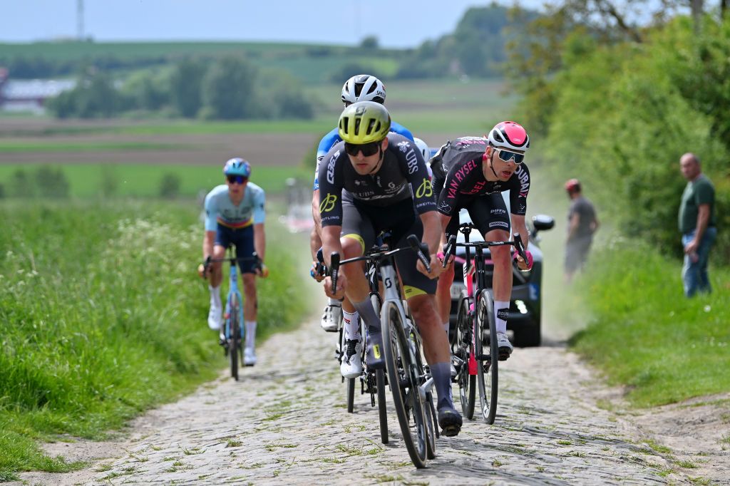 PONTMARCQ FRANCE MAY 17 Samuel Leroux of France and Team Van Rysel Roubaix competes in the breakaway passing through a cobblestones sector during the 68th 4 Jours de Dunkerque Grand Prix des Hauts de France 2024 Stage 4 a 1668km stage from Mazingarbe to PontMarcq on May 17 2024 in PontMarcq France Photo by Luc ClaessenGetty Images