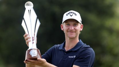 Nick Bachem with the Jonsson Workwear Open trophy following his 2023 win