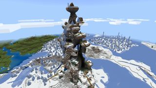 Minecraft seeds - a towering snow mountain with a village sprawled upon it