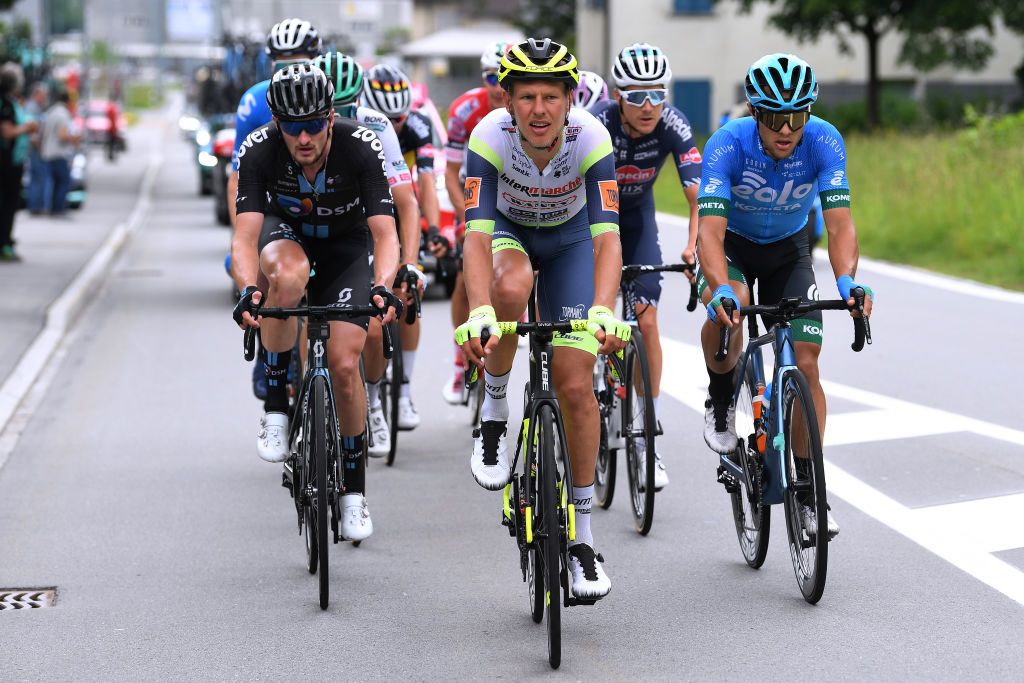 VALLE SPLUGA ALPE MOTTA ITALY MAY 29 Nico Denz of Germany and Team DSM Taco Van Der Hoorn of Netherlands and Team Intermarch Wanty Gobert Matriaux Vincenzo Albanese of Italy and EOLOKOMETA Cycling Team in breakaway during the 104th Giro dItalia 2021 Stage 20 a 164km stage from Verbania to Valle Spluga Alpe Motta 1727m Switzerland CHE UCIworldtour girodiitalia Giro on May 29 2021 in Valle Spluga Alpe Motta Italy Photo by Tim de WaeleGetty Images