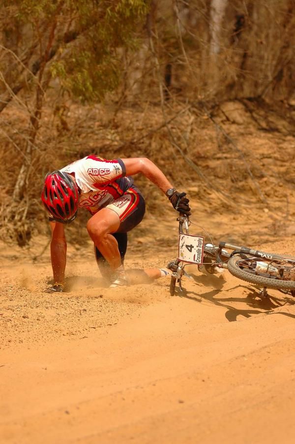 Shane Taylor takes a spill in the sand.