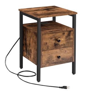 Industrial looking wood effect nightstand with black metal details, a shelf, two drawers and built-in outlets.