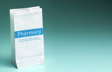image of a pharmacy bag on a table