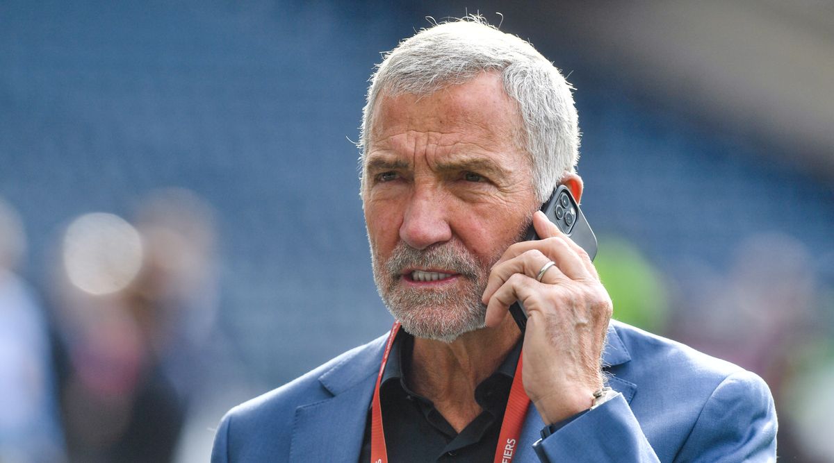 Graeme Souness talking on a mobile phone