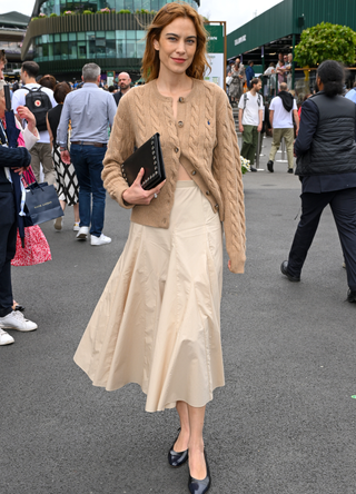 Alexa Chung, wearing Ralph Lauren, attends the Wimbledon Tennis Championships at the All England Tennis and Croquet Club on at Wimbledon on July 10, 2024 in London, England