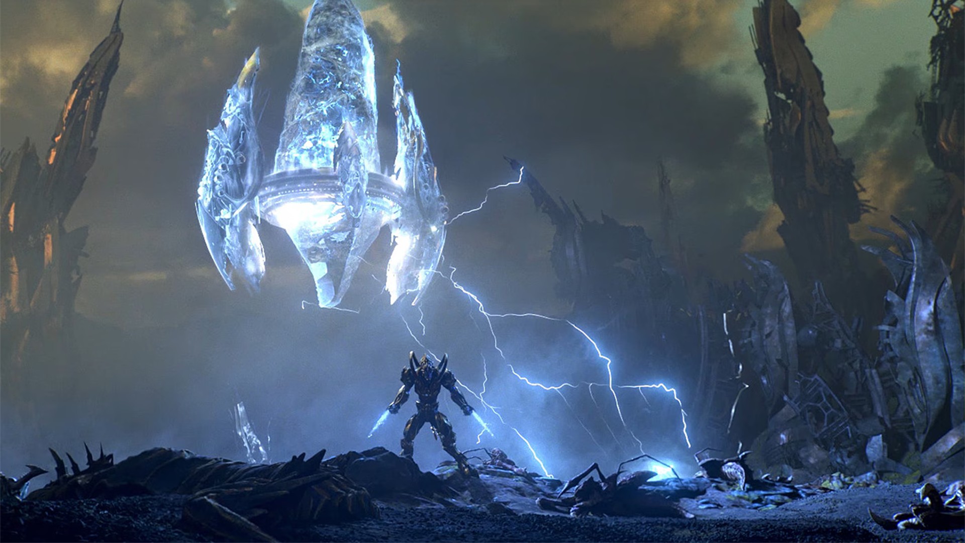 Still from the video game StarCraft 2. An armored human-like being is wielding two blue-white laser blades. Just above them, crackling with powerful lightening energy is a floating, electrified base.