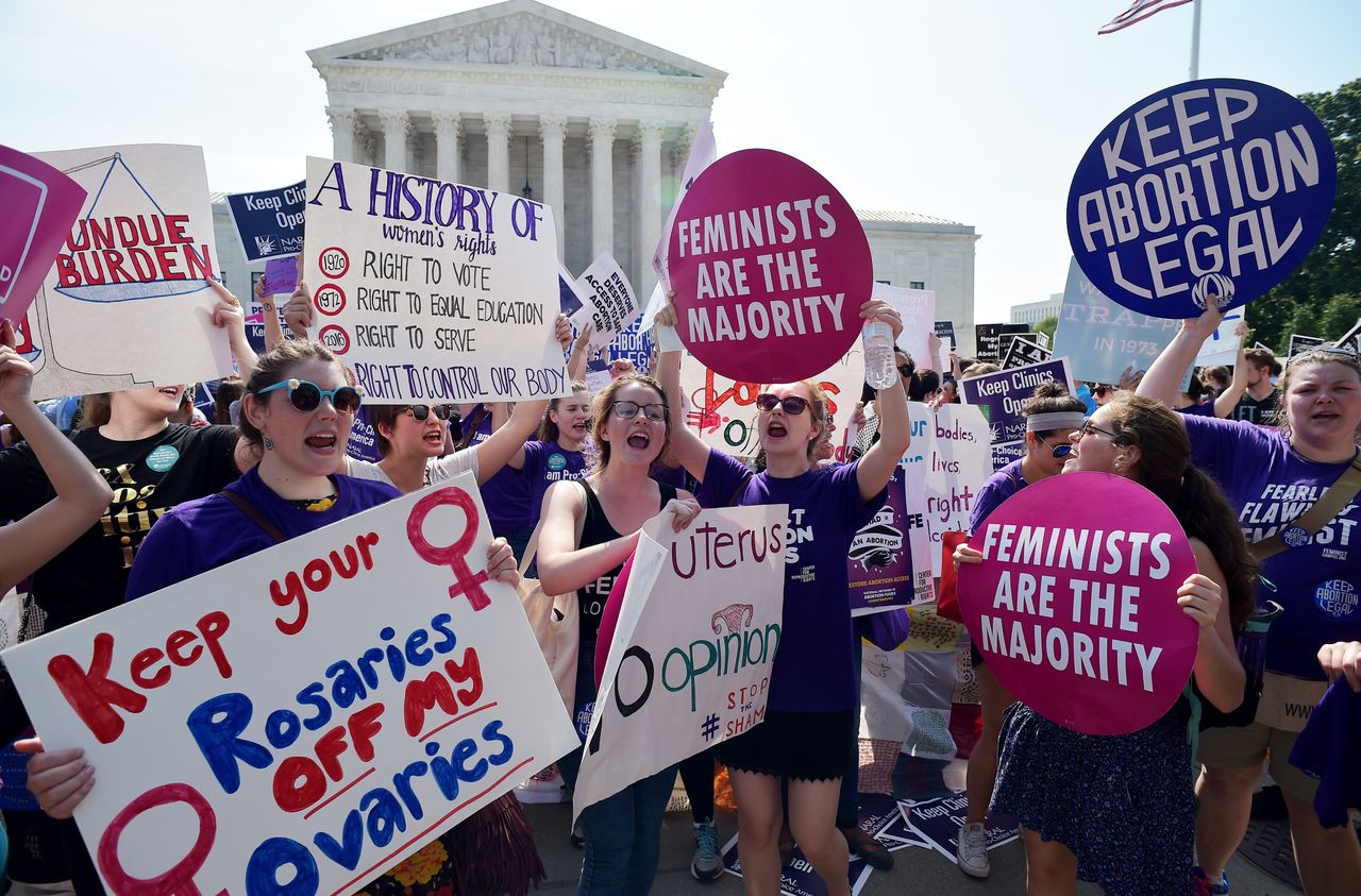 Abortion rights activists cheer the court&amp;#039;s decision Monday.