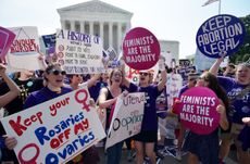 Abortion rights activists cheer the court's decision Monday.