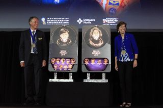 Michael Foale and Ellen Ochoa pose with their plaques after being inducted into the U.S. Astronaut Hall of Fame at NASA’s Kennedy Space Center Visitor Complex in Florida on Friday, May 19, 2017.