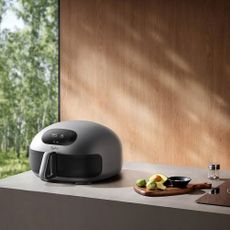 The Typhur Dome air fryer in a modern kitchen on a worktop