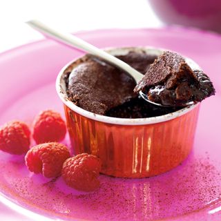 chocolate fondant on pink plate and strawberry