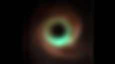 A cloudy image of a black hole in different colors