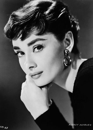 Audrey Hepburn with her trademark pixie cut hairstyle