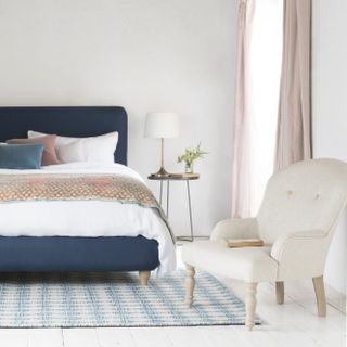 Bedroom with blue Loaf bed and pink Loaf curtains