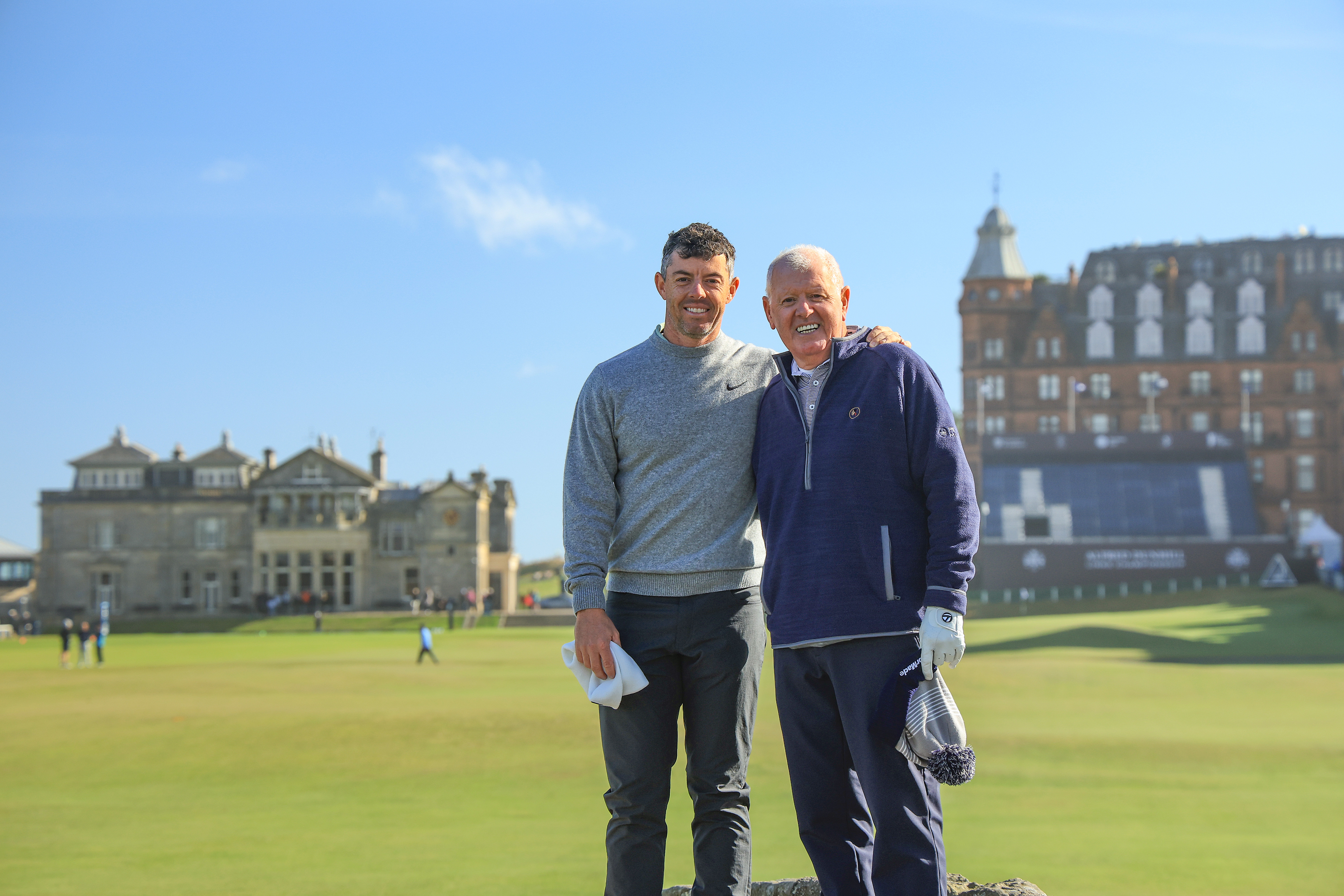 Rory and Gerry McIlroy pose for a photo in front of St Andrews