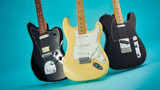 Three Fender Player Series guitars on a blue background