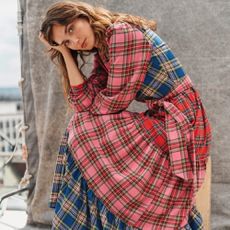 Model wearing plaid multi-coloured Boden dress