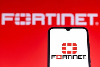 Fortinet logo and branding displayed on a smartphone with second logo in background in white lettering on red 