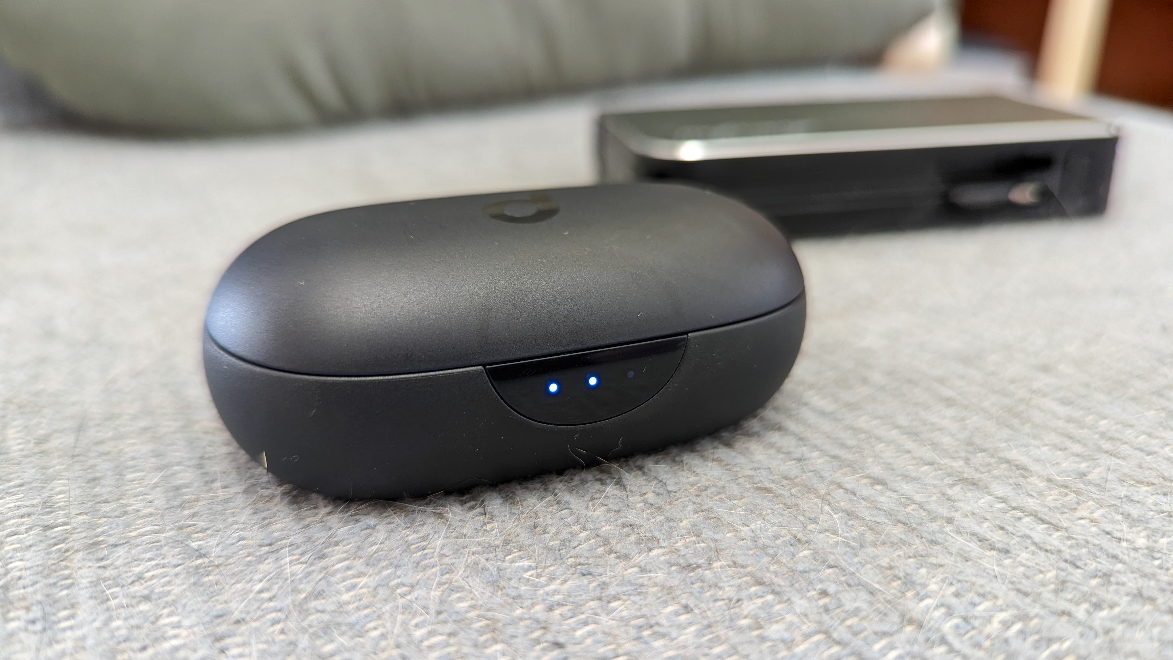 The Anker Soundcore Sport X10 charging case being charged via USB-C cable