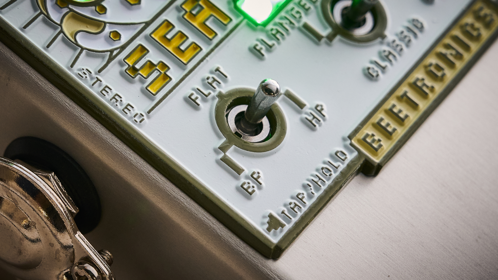 Close up of the EQ switch on the Beetronics Seabee Lite chorus pedal