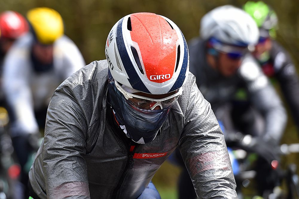 Riders completely covered up to protect themselves from the cold at Liege-Bastogne-Liege