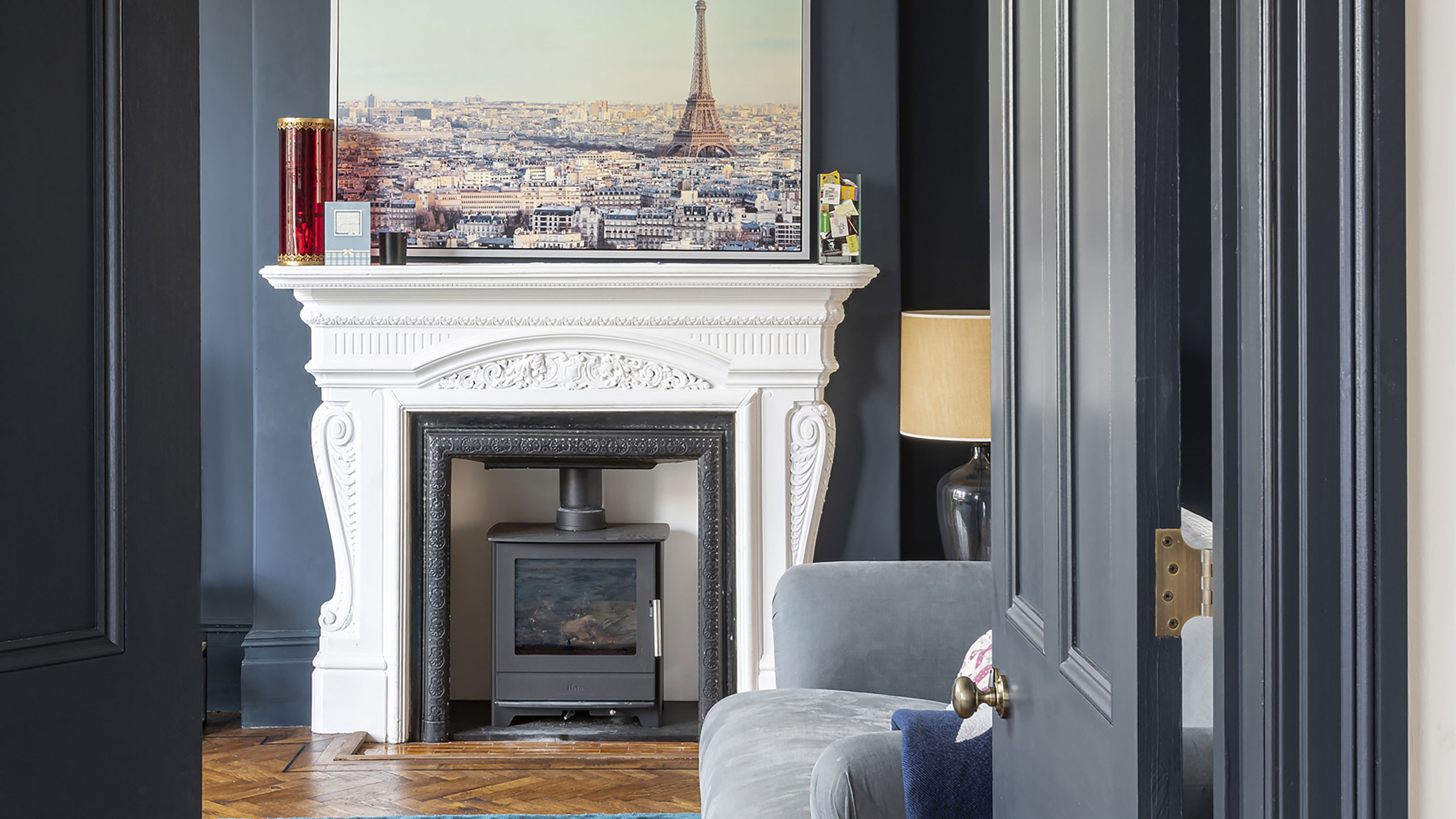 original stone fireplace with log burning stove