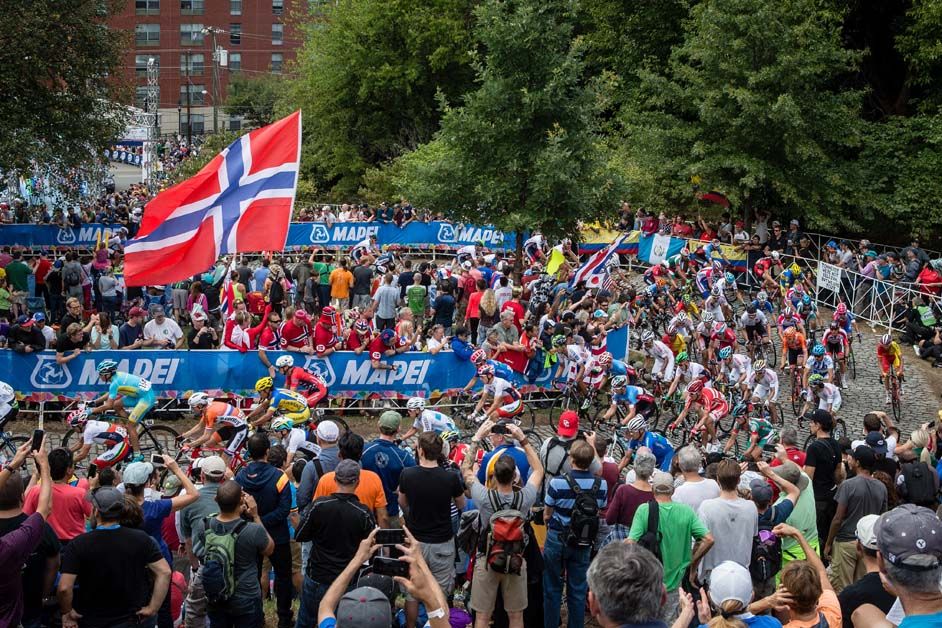 Huge crowds watch on during the men's road race