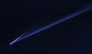 This Hubble Space Telescope image reveals the gradual self-destruction of the asteroid (6478) Gault, whose ejected dusty material has formed two long, thin, comet-like tails. The longer tail stretches more than 500,000 miles (800,000 kilometers) and is roughly 3,000 miles (4,800 km) wide. The shorter tail is about a quarter as long. The streamers will eventually disperse into space.