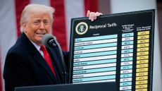 President Donald Trump unveils tariffs in April