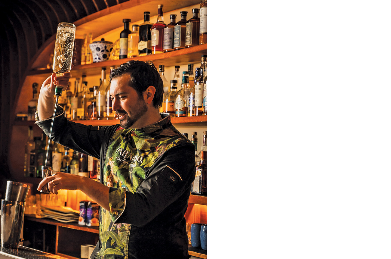 Giacomo Giannotti of Paradiso, Barcelona, pouring a cocktail