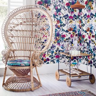 room containing floral wallpaper botanic printed walls and chair