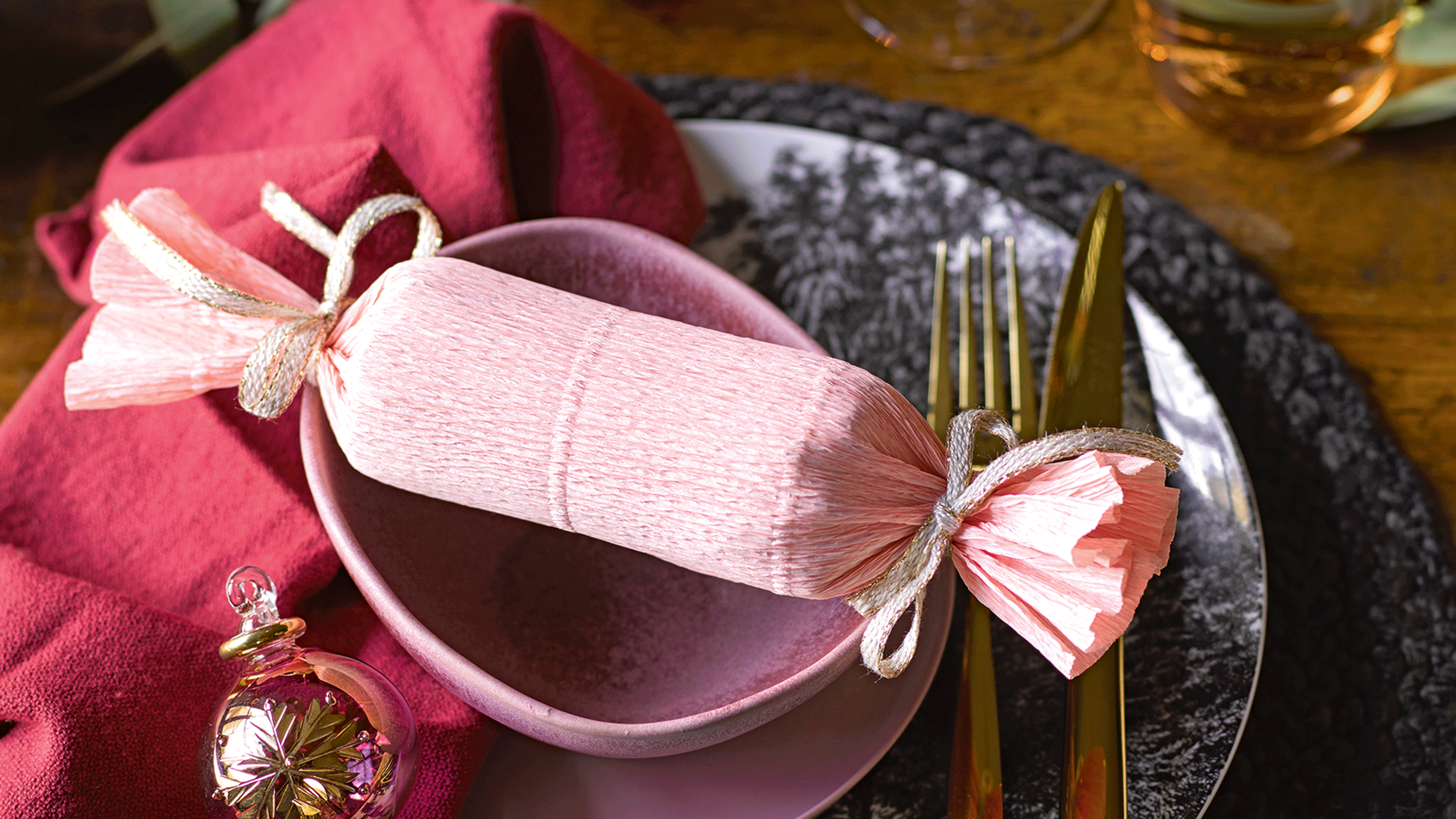 Paper napkin with gold ribbon with silver gold and pink Christmas table