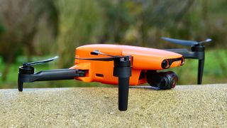 Autel Evo Nano Plus drone sat on a garden wall