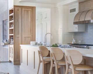 kitchen island with wooden seating