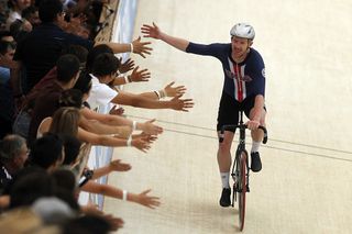 US cyclist Daniel Holloway celebrates the first place in the men's Omnium Points Race 4\4, during the Tissot UCI Track Cycling World Cup