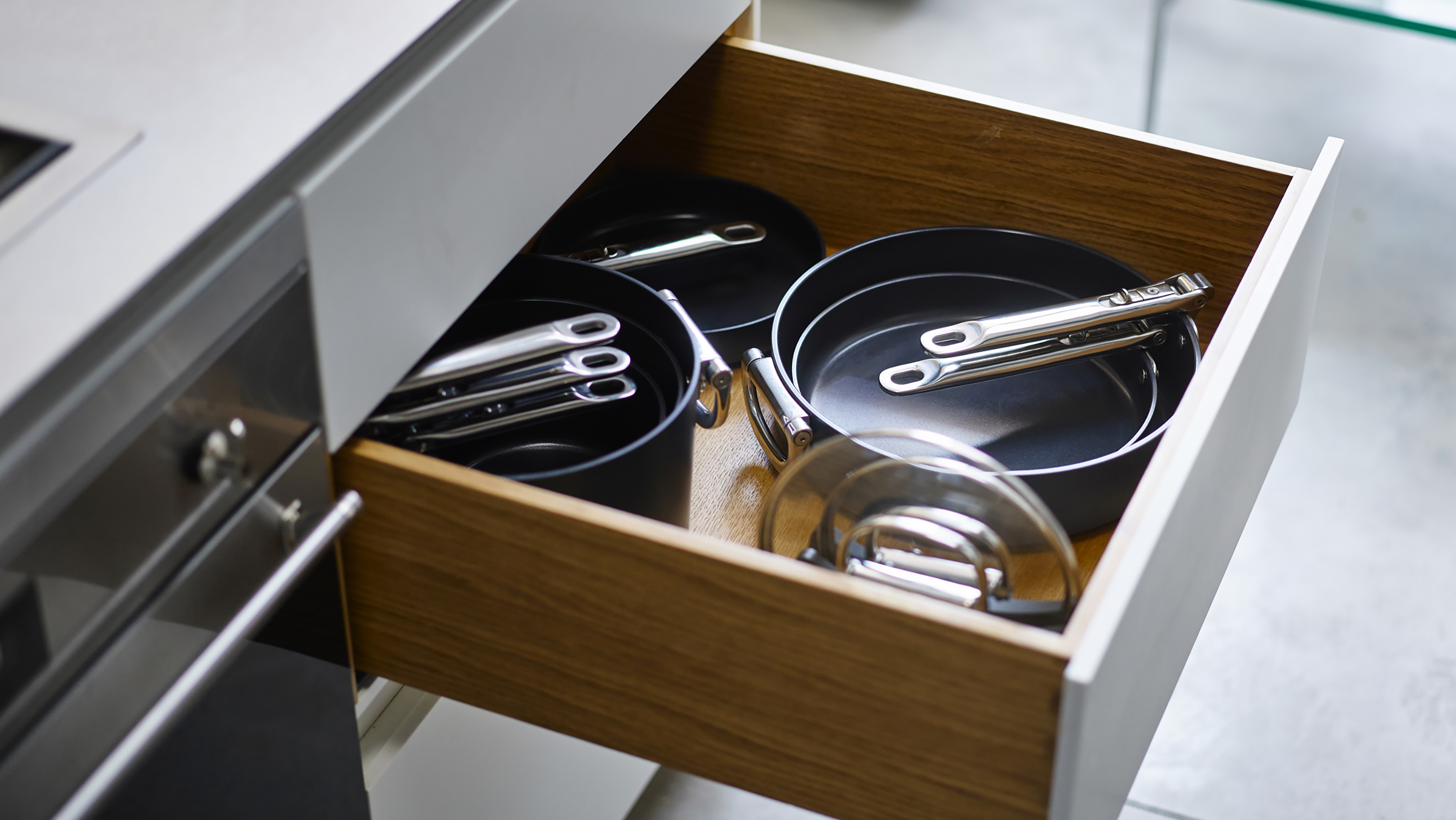 Joseph Joseph pans in drawer