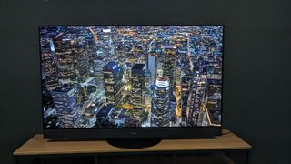 Panasonic MZ1500 with aerial shot of city at night on screen
