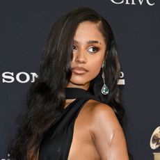 Tyla wears a black cut-out gown to attend the 68th GRAMMY Awards Pre-GRAMMY Gala on January 31, 2026 in Beverly Hills, California