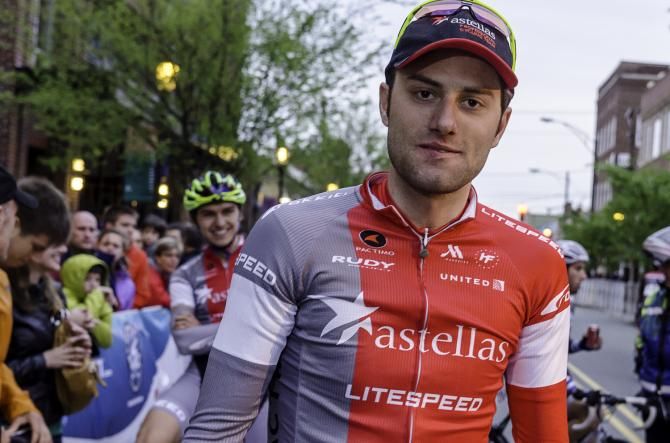 Astellas Cycling rider Chris Uberti couldnt look more pleased of the win taken by Brecht Dhaene on Saturday.
