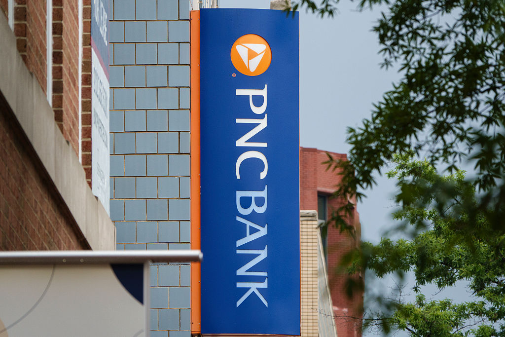 A PNC Bank logo is displayed on a sign outside of a branch on May 31, 2025 in Washington, DC.