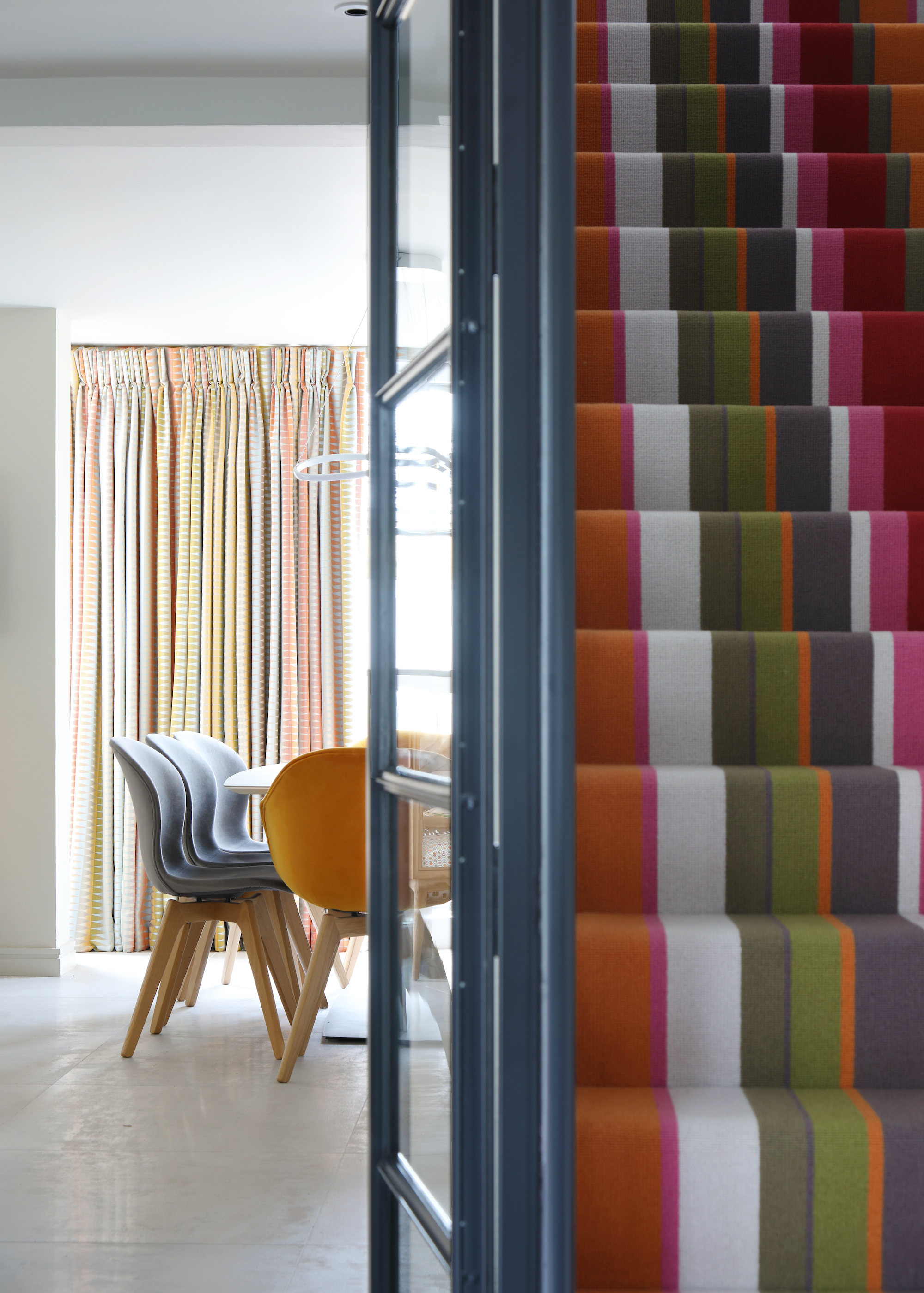 staircase with chunky striped runner