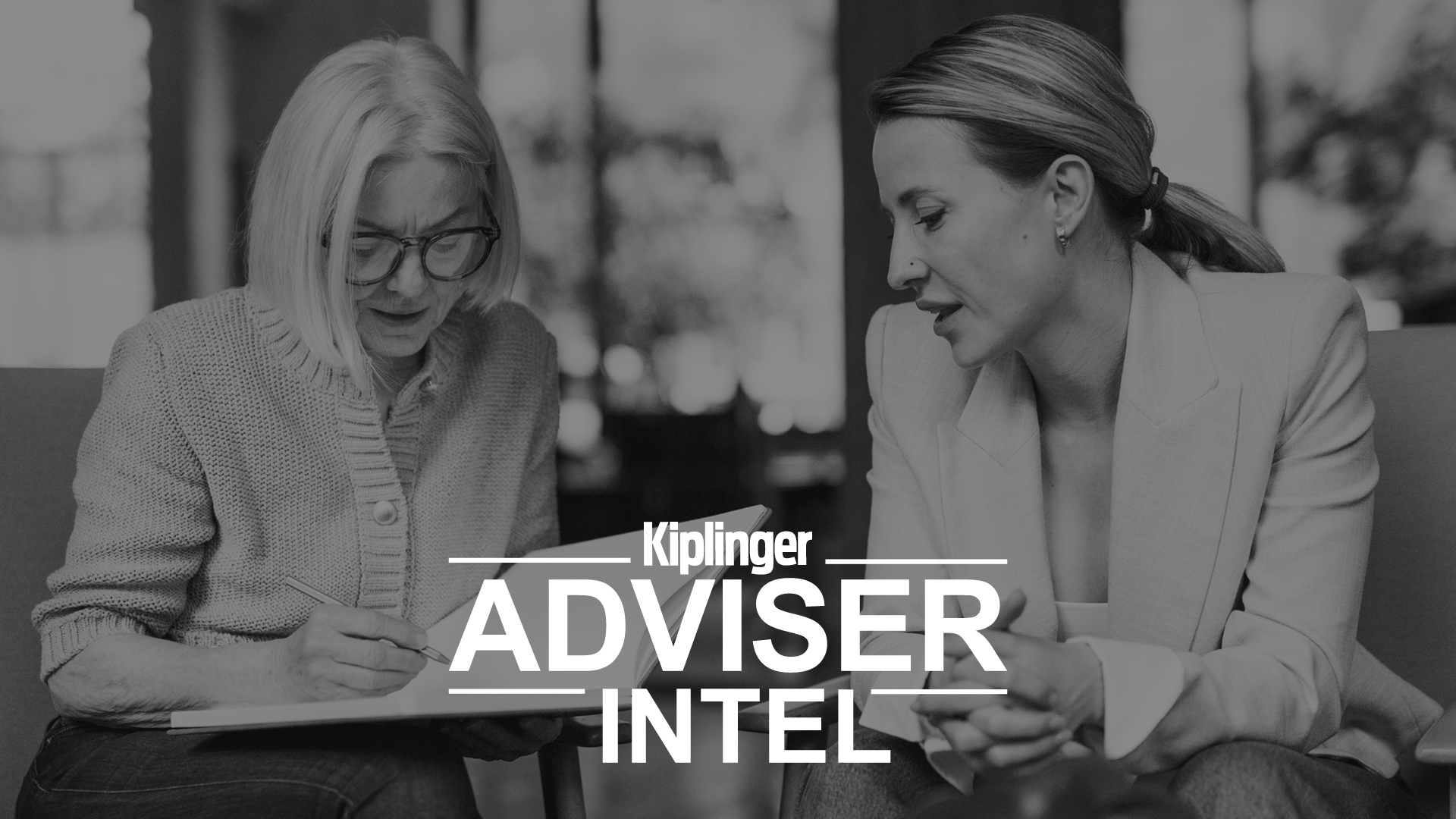 Black and white image of two women, possibly and adviser and her client looking at paperwork. The logo &quot;Kiplinger Adviser Intel&quot; is overlaid on the image