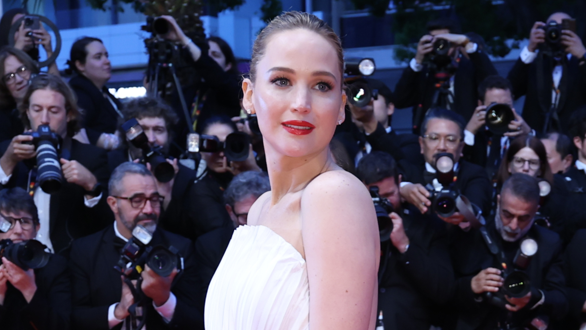 Jennifer Lawrence wears a white custom Dior gown to Cannes Film Festival