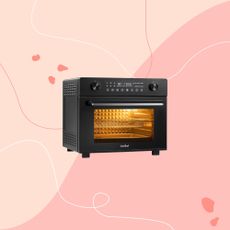 A VonShef air fryer oven on a pink Ideal Home background 