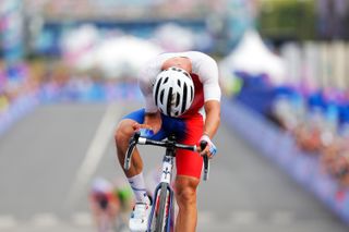 Paris, France - Men’s Road Race - Valentin Madouas (France) celebrates crossing the line in second at his home olympics