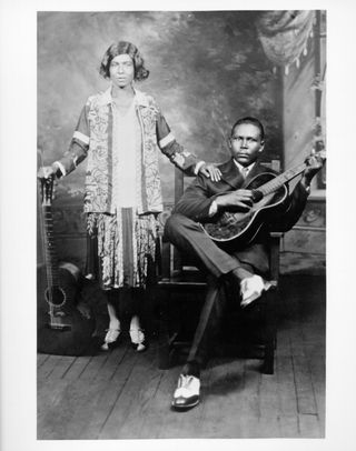 Blues guitarist and singer Memphis Minnie and her husband guitarist Kansas Joe McCoy pose for a portrait circa 1930.