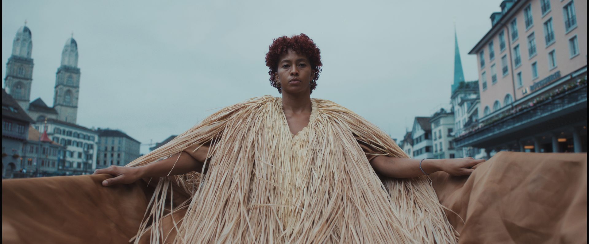A woman in a grass dress
